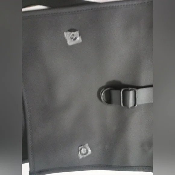 Rains Black Minimalist Backpack with Flap Closure